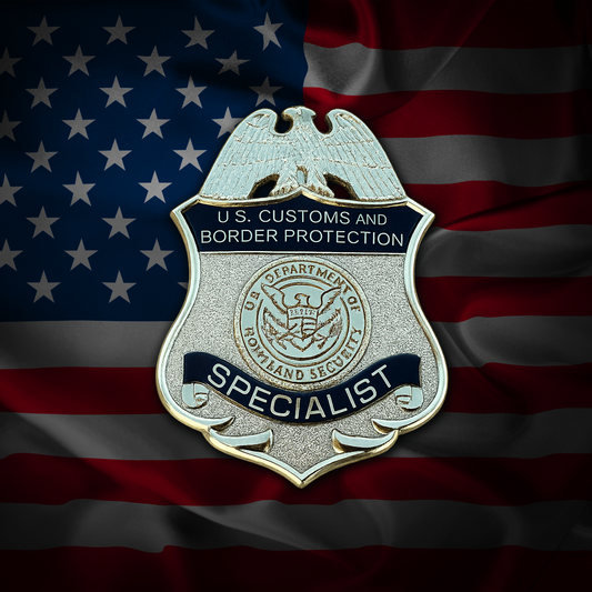 U.S. Customs and Border Protection Specialist flex badge on an American flag background
